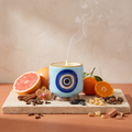 Paddywax Adopo Eye – Incense & Smoke Keramik Duftkerze mit Duftzutaten: Grapefruit, Mandarine, Zimt, Nelke, Gewürzorchidee, Tonkabohne, Weihrauch, Myrrhe und Zedernholz